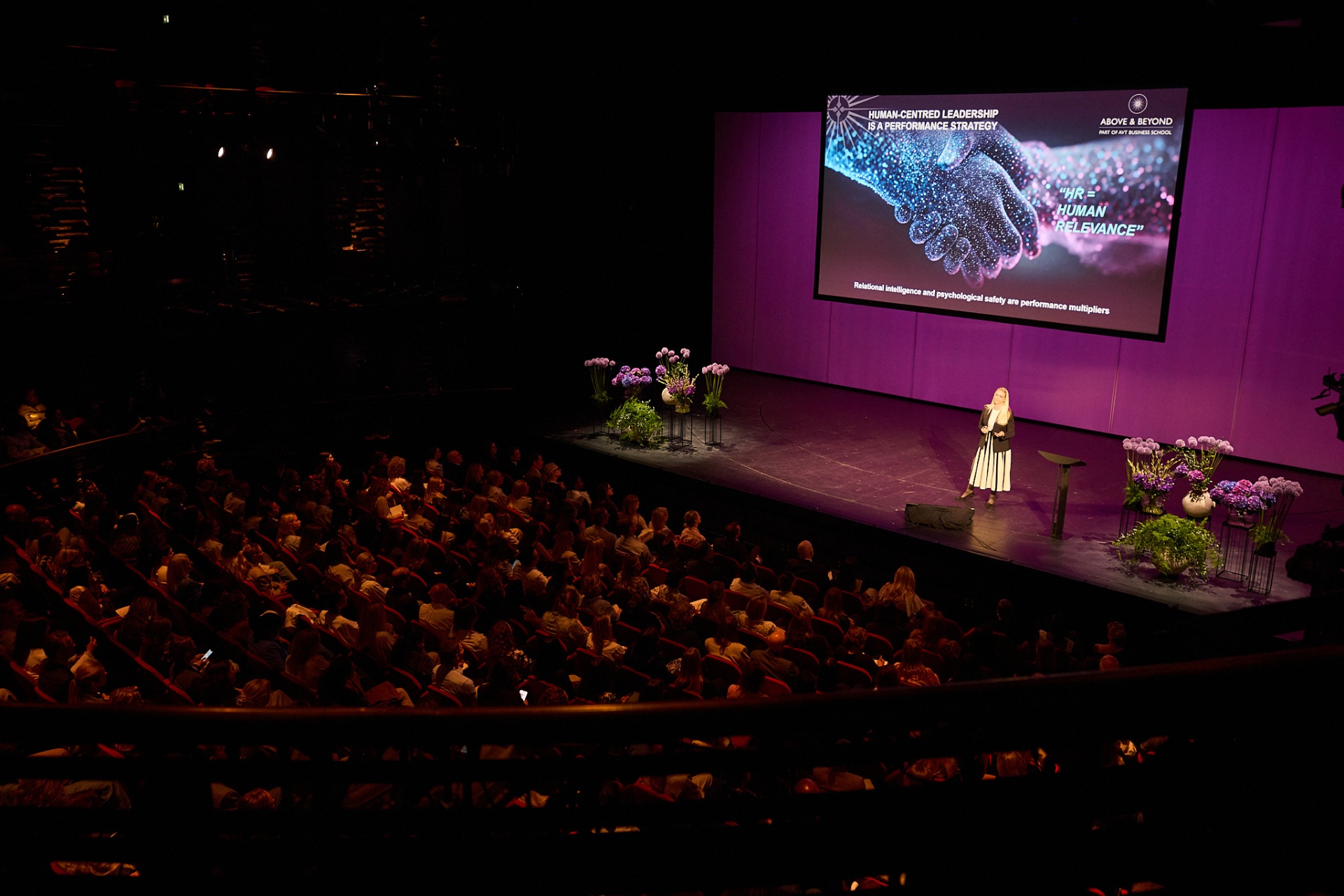 Speaker on stage at the Visionary Summit